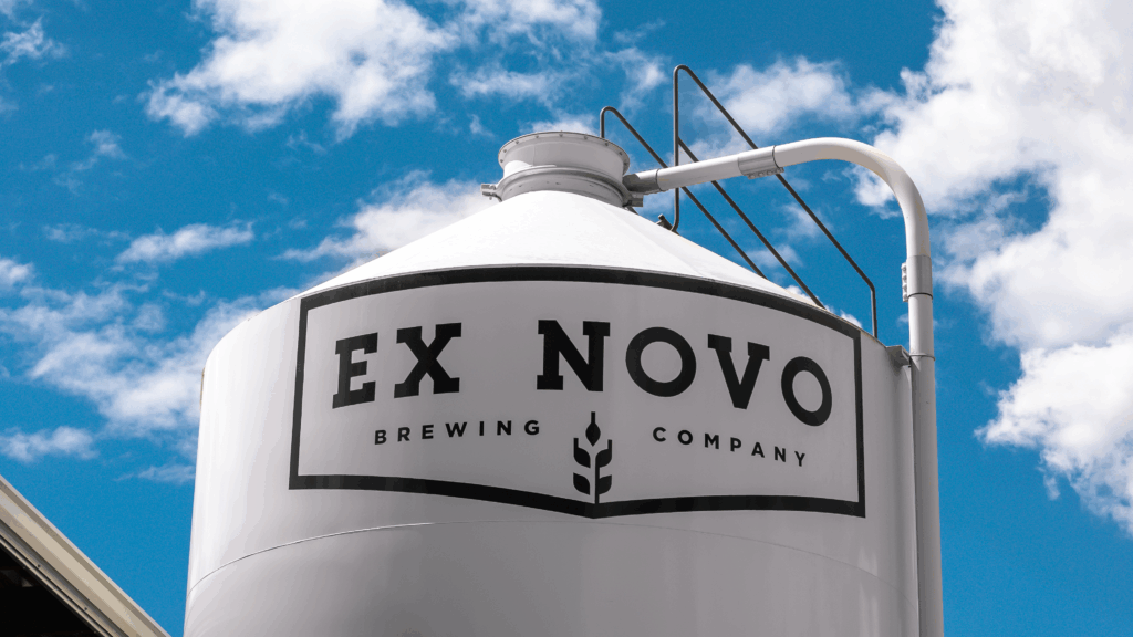 Ex Novo Brewing tank with the Ex Novo logo